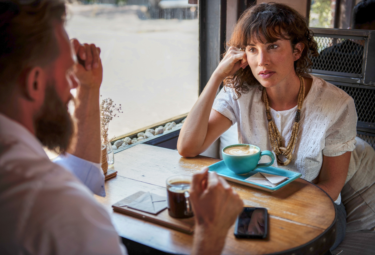 COUPLE TALKING OVER COFFEE Polo Park Hearing Centre Winnipeg