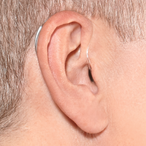 mini-behind-the-ear-hearing-aid-in-ear