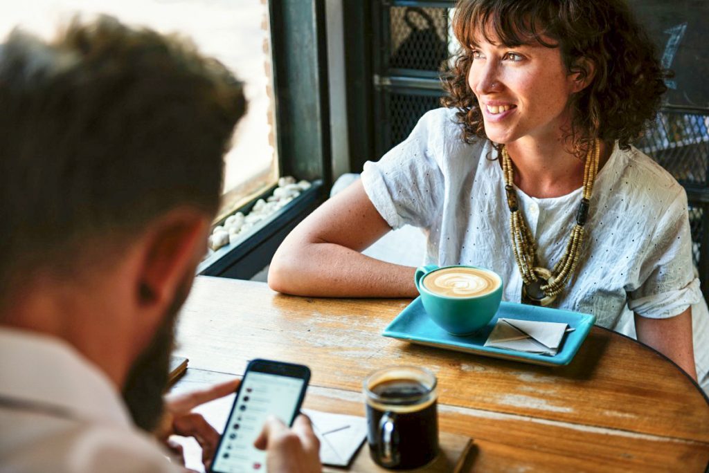 Couple Talking Over Coffee May Month