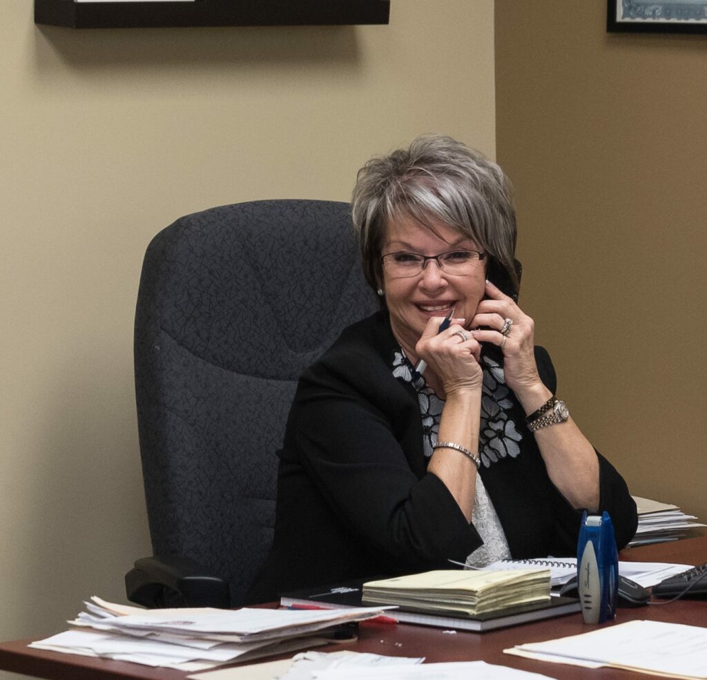 Hearing Aid Grant For Manitoba Seniors 5 Leslie on Phone - Call Us