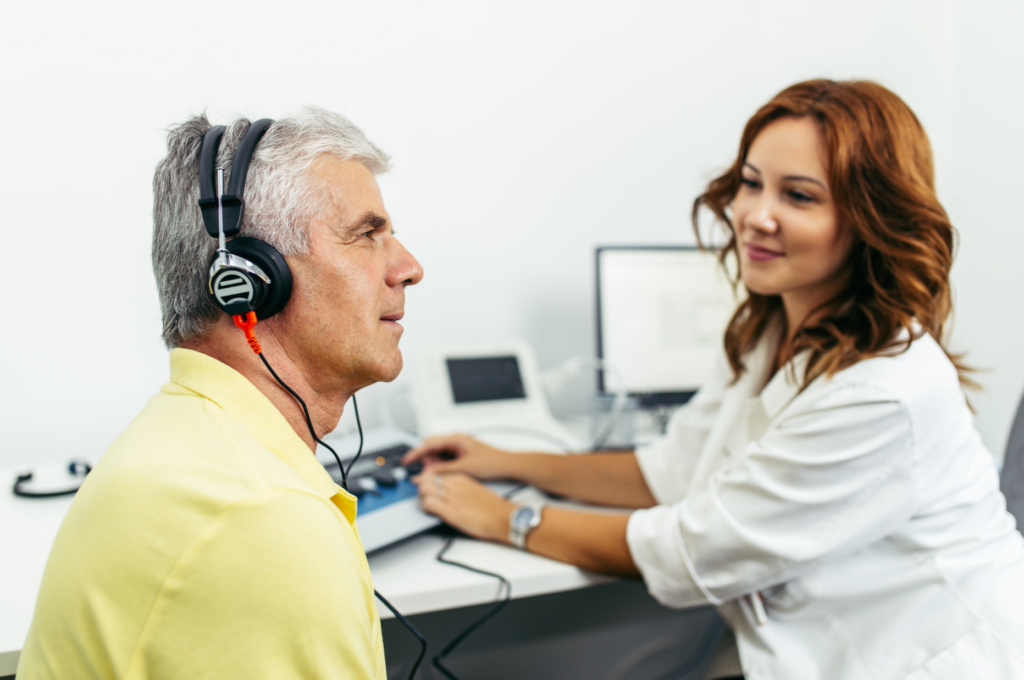 man-hearing-test-in-winnipeg