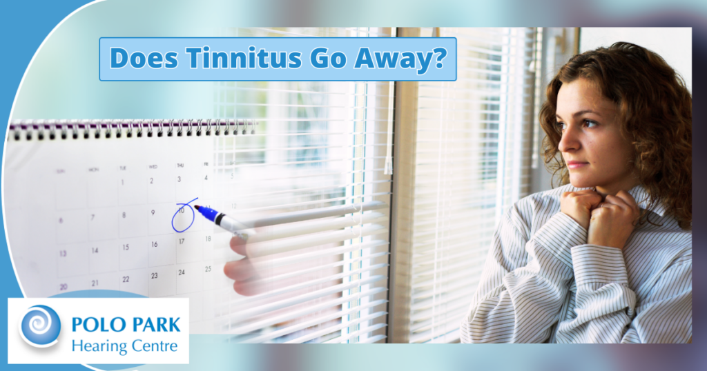 woman with tinnitus looking out window